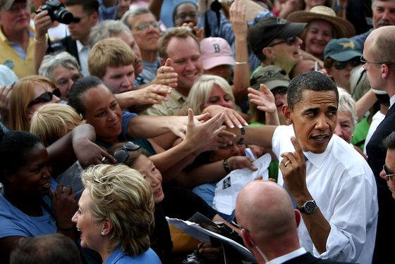 UNITY, NH - JUNE 27:  Democratic presidential candidate Sen. Barack Obama (D-IL) greets the crowd after appearing with Sen. Hillary Rodham Clinton (D-NY)  June 27, 2008 in Unity, New Hampshire. Obama and Clinton appeared together in a show of unity for Obama's presidential campaign.  (Photo by Mario Tama/Getty Images)