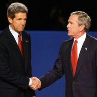 TEMPE, AZ - OCTOBER 13: U.S. President George W. Bush (R) and Democratic presidential candidate Sen. John Kerry (D-MA) shake hands before the start of a 90-minute debate on the campus of Arizona State University October 13, 2004 in Tempe, Arizona. Tonight's debate is the last of three scheduled before the November 2 election and will focus on domestic issues.  (Photo by Joe Raedle/Getty Images)