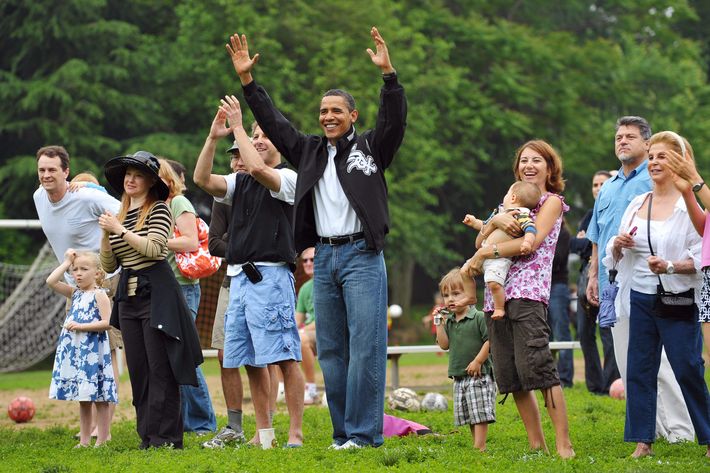 US President Barack Obama (C) celebrates after his daughter Sasha's soccer team scored a goal during a game in Georgetown, May 16, 2009 in Washington, DC. AFP PHOTO/Mandel NGAN (Photo credit should read MANDEL NGAN/AFP/Getty Images)