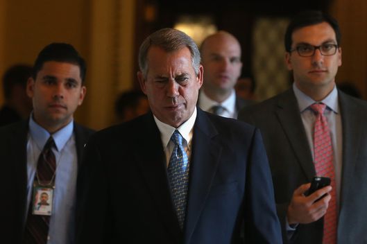 House Speaker John Boehner (R-OH) walks through the House side of the US Capitol February 27, 2015 in Washington, DC. Later today the House will vote on a three week continuing resolution for funding the Department of Homeland Security. 