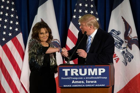 Donald Trump shakes hands with Sarah Palin on January 19, 2016 in Ames, IA. Trump received Palin's endorsement at the event.  
