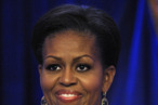 Michelle Obama Wore a Sleeveless Blouse With a Bold, Smudgey Print
