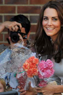 Britain's Catherine, the Duchess of Cambridge, meets wellwishers as she leaves with her husband Prince William (not pictured) after opening a children's cancer unit at the Royal Marsden Hospital in Sutton, in south-east England, on September 29, 2011. AFP PHOTO/BEN STANSALL (Photo credit should read BEN STANSALL/AFP/Getty Images)