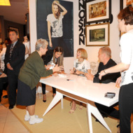 NEW YORK - SEPTEMBER 10:  Vogue editor-in-chief Anna Wintour (L,center) and designer Michael Kors attend the Fashion's Night Out Kick-Off event at the Vogue Pop Up Boutique at Macy's Queens on September 10, 2009 in New York City.  (Photo by Gary Gershoff/Getty Images for Macy's)