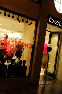 LAS VEGAS, NV - SEPTEMBER 08:  Customers walk by a Bebe store during Fashion's Night Out at The Forum Shops at Caesars on September 8, 2011 in Las Vegas, Nevada.  (Photo by Ethan Miller/Getty Images for The Forum Shops)