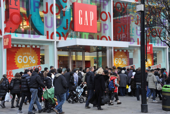 LONDON, UNITED KINGDOM - DECEMBER 26: Eager shoppers descend on stores on Oxford Street for the Boxing Day sales on December 26, 2011 in London, England. Dubbed "Mega Monday" as an anticipated 700,000 international and domestic shoppers flood into the Oxford Street area of London's West End, in the first three hours of trading GBP&pound;15 million had reportedly already rung through the tills, with retailers optimistic to reach GBP&pound;50 million by close of day.  (Photo by Stuart Wilson/Getty Images for New West End Company)