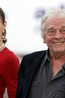 US photographer David Bailey (R)  smiles as he arrives for a charity gala dinner at Kensington Palace in London on June 9, 2011. Britain's Duke and Duchess of Cambridge, Prince William and Catherine were in attendance, their first official royal engagement, for a dinner in aid of a childrens charity, ARK (Absolute Return for Kids).     AFP PHOTO/ ADRIAN DENNIS (Photo credit should read ADRIAN DENNIS/AFP/Getty Images)