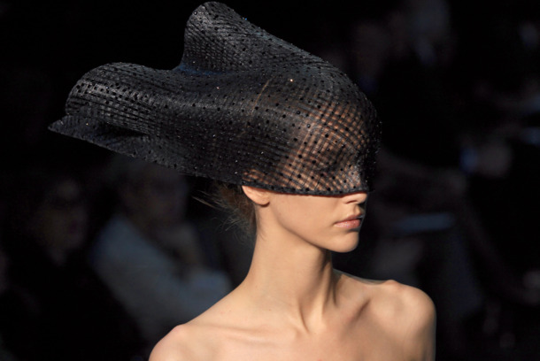 A model presents a creation by Giorgio Armani Prive during the Spring/Summer 2012 Haute Couture collection show, on January 24, 2012 in Paris. AFP PHOTO/PIERRE VERDY (Photo credit should read PIERRE VERDY/AFP/Getty Images)