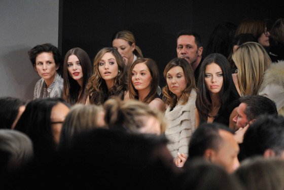 NEW YORK, NY - FEBRUARY 13: (2nd-L, L-R) Actresses Ashley Greene, Emmy Rossum, Rose McGowan, guest, and model Adriana Lima attend the Donna Karan New York Fall 2012 fashion show during Mercedes-Benz Fashion Week at the 547 West 26th Street on February 13, 2012 in New York City.  (Photo by Gary Gershoff/WireImage)