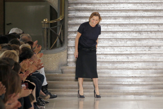 Italian designer Miuccia Prada acknowledges the public following the Miu Miu Autumn/Winter 2011-2012 ready-to-wear collection show on March 9, 2011 in Paris. AFP PHOTO/Pierre Verdy (Photo credit should read PIERRE VERDY/AFP/Getty Images)