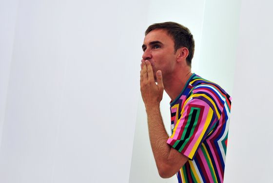 Belgian fashion designer Raf Simons acknowledges the audience at the end of Jil Sander Spring-Summer 2012 ready-to-wear collection on September 24, 2011 during the Women's Mialn fashion week.  AFP PHOTO / GIUSEPPE CACACE (Photo credit should read GIUSEPPE CACACE/AFP/Getty Images)