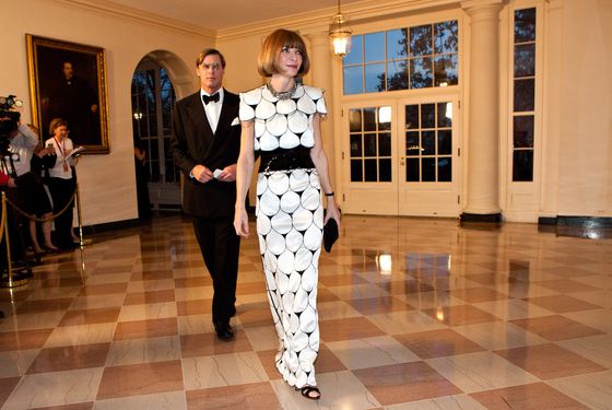 WASHINGTON - MARCH 14: Anna Wintour, editor-in-chief of Vogue magazine (R), arrives with Shelby Bryan for a State Dinner in honor of British Prime Minister David Cameron at the White House on March 14, 2012 in Washington, DC. Cameron is on a three day official visit to Washington. (Photo by Brendan Hoffman/Getty Images)