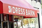 Pedestrians pass by a Dress Barn store in New York, U.S. on Wednesday, Sept. 19, 2007. Dress Barn Inc., the women's clothing retailer with 1,428 stores, rose as much as 8.3 percent in U.S. trading after reporting fourth-quarter profit that exceeded analysts' estimates. Photographer: Stephen Hilger/Bloomberg News