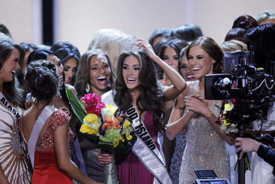 LAS VEGAS, NV - JUNE 3:   Miss Rhode Island USA Olivia Culpo (C) is greeted by contestants after winning the 2012 Miss USA pageant at the Planet Hollywood Resort & Casino on June 3, 2012 in Las Vegas, Nevada.  (Photo by Isaac Brekken/Getty Images)