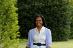 First lady Michelle Obama arrives for an interview with The Associated Press to talk about the White House Kitchen Garden, Tuesday, June 5, 2012, on the South Lawn of the White House in Washington. (AP Photo/Charles Dharapak)