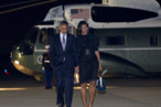 President Barack Obama and first lady Michelle Obama walks from Marine One to board Air Force One at John F. Kennedy International Airport,  Friday, June 15, 2012, in Andrews Air Force Base, Md., en route Washington. (AP Photo/Carolyn Kaster)