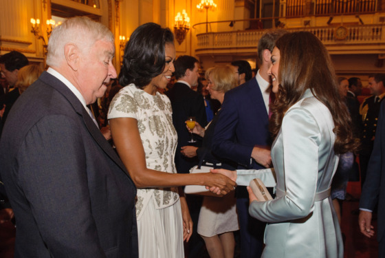 LONDON, ENGLAND - JULY 27:  US First Lady Michelle Obama and US Ambassador Louis Susman (L) meets Catherine, Duchess of Cambridge as US Ambassador Louis Susman looks on during a reception at Buckingham Palace a reception for Heads of State and Government attending the Olympics Opening Ceremony  on July 27, 2012 in London, England.  (Photo by Dominic Lipinski - WPA Pool/Getty Images)