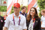 LONDON, ENGLAND - JULY 31:  Prince William, Duke of Cambridge and Catherine, Duchess of Cambridge during a visit to the Team GB accommodation flats in the Athletes Village at the Olympic Park in Stratford on Day 4 of the London 2012 Olympic Games on July 31, 2012 in London, England.  (Photo by John Stillwell - WPA Pool/Getty Images)
