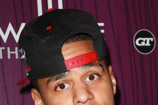 LOS ANGELES, CA - AUGUST 28: Rapper J. Cole attends Cash Money Records' Lil Wayne album release party for "Tha Carter IV" at Boulevard3 on August 28, 2011 in Los Angeles, California. (Photo by David Livingston/Getty Images)