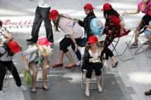 LONDON, UNITED KINGDOM - AUGUST 19: Participants at the 'Trident Unwraps Hundreds of Musical Chairs' contest to win Beyonce concert tickets on August 19, 2009 in London, England. (Photo by Neil Mockford/Getty Images)