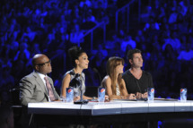 THE X FACTOR: THE X FACTOR is the new competition series that gives viewers the opportunity to help choose the next global superstar or breakout music group. Judges Simon Cowell, Paula Abdul, L.A. Reid and Nicole Scherzinger will travel the nation searching for undiscovered talent. Hosted by Steve Jones, the two-night series premiere will showcase the live auditions which took place in front of audiences of thousands, around the country Wednesday, Sept. 21 (8:00-10:00 PM ET/PT) and Thursday, Sept. 22 (8:00-10:00 PM ET/PT) on FOX. Pictured L-R: L.A. Reid, Nicole Scherzinger, Paula Abdul and Simon Cowell. CR: Ray Mickshaw / FOX.
