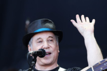 GLASTONBURY, ENGLAND - JUNE 26: (UK TABLOID NEWSPAPERS OUT) Paul Simon performs on the Pyramid Stage at the Glastonbury Festival at Worthy Farm, Pilton on June 26, 2011 in Glastonbury, England. The festival, which started in 1970 when several hundred hippies paid 1 GBP to watch Marc Bolan, has grown into Europe's largest music festival attracting more than 175,000 people over five days. (Photo by Dave Hogan/Getty Images)