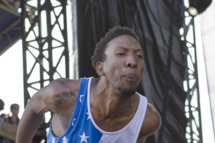NEW ORLEANS, LA - OCTOBER 30: Rapper-producer Left Brain of the alternative hip-hop collective Odd Future Wolf Gang Kill Them All Future, shouts obscenities to a female photographer in the photo-pit right after hitting her during the 2011 Voodoo Experience at City Park on October 30, 2011 in New Orleans, Louisiana. (Photo by Skip Bolen/WireImage)