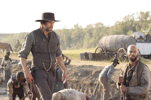Cullen Bohannon (Anson Mount) and Elam Jefferson (Common) - Hell On Wheels - Season 1, Episode 1 - Photo Credit: Chris Large/AMC - HOW_101_2425