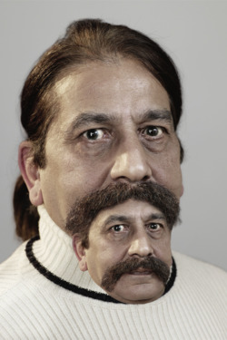 Studio portrait of man with moustache Studio portrait of man with moustache