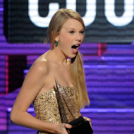 LOS ANGELES, CA - NOVEMBER 20: Singer Taylor Swift accepts Favorite Country Female Artist award onstage at the 2011 American Music Awards held at Nokia Theatre L.A. LIVE on November 20, 2011 in Los Angeles, California. (Photo by Kevork Djansezian/Getty Images) LOS ANGELES, CA - NOVEMBER 20: Singer Taylor Swift accepts Favorite Country Female Artist award onstage at the 2011 American Music Awards held at Nokia Theatre L.A. LIVE on November 20, 2011 in Los Angeles, California. (Photo by Kevork Djansezian/Getty Images)