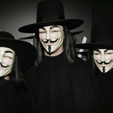 LONDON - MARCH 08: (UK TABLOID NEWSPAPERS OUT) Actors in character costume arrive at the UK Premiere of "V For Vendetta" at the Empire Leicester Square on March 8, 2006 in London, England. The film is based on the Alan Moore book set in the and is written and co-produced by The Matrix duo Andy and Larry Wachowski. (Photo by Dave Hogan/Getty Images)