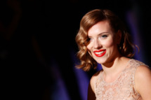 MILAN, ITALY - SEPTEMBER 25: Actress Scarlett Johansson attends the Dolce & Gabbana Spring/Summer 2012 fashion show as part Milan Womenswear Fashion Week on September 25, 2011 in Milan, Italy. (Photo by Vittorio Zunino Celotto/Getty Images)