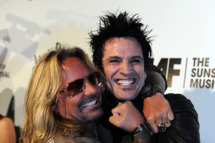 WEST HOLLYWOOD, CA - AUGUST 18: Motley Crue band members (L-R) Vince Neil and Tommy Lee arrive at the Annual Sunset Strip Music Festival, Tribute to Motley Crue at the House of Blues Sunset Blvd on August 18, 2011 in West Hollywood, California. (Photo by Frazer Harrison/Getty Images)