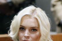 LOS ANGELES, CA - NOVEMBER 02: Lindsay Lohan sits in court during her probation violation hearing at the Airport Courthouse on November 2, 2011 in Los Angeles, California. Lohan was sentenced to 300 days in jail, starting November 9, for violating her probation but will only server 30 days if she follows the conditions set out by Judge Sautner which include serving the remainder of her community service at the Los Angeles County Coroner's office and attending psychotherapy sessions. Lohan had previously been sentenced to a total of 480 hours of community service stemming from a 2007 drunk-driving conviction and a jewelry theft conviction earlier this year. (Photo by Mario Anzuoni-Pool/Getty Images)