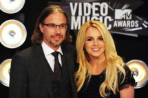 Jason Trawick (L) and Britney Spears arrive at the 2011 MTV Video Music Awards (VMAs) August 28, 2011 at the Nokia Theatre in downtown Los Angeles, California. AFP PHOTO / Frederic J. Brown (Photo credit should read FREDERIC J. BROWN/AFP/Getty Images)
