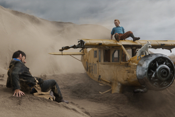 Left to right: Captain Haddock (Andy Serkis), Tintin (Jamie Bell), and Snowy in THE ADVENTURES OF TINTIN, from Paramount Pictures and Columbia Pictures in association with Hemisphere Media Capital. Left to right: Captain Haddock (Andy Serkis), Tintin (Jamie Bell), and Snowy in THE ADVENTURES OF TINTIN, from Paramount Pictures and Columbia Pictures in association with Hemisphere Media Capital.