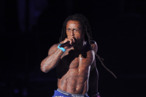 LOS ANGELES, CA - AUGUST 28: Rapper Lil Wayne performs onstage during the 2011 MTV Video Music Awards at Nokia Theatre L.A. LIVE on August 28, 2011 in Los Angeles, California. (Photo by Kevin Winter/Getty Images) LOS ANGELES, CA - AUGUST 28: Rapper Lil Wayne performs onstage during the 2011 MTV Video Music Awards at Nokia Theatre L.A. LIVE on August 28, 2011 in Los Angeles, California. (Photo by Kevin Winter/Getty Images)