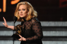 Singer Adele speaks after receiving her Grammy award at the Staples Center during the 54th Grammy Awards in Los Angeles, California, February 12, 2012. AFP PHOTO Robyn BECK (Photo credit should read ROBYN BECK/AFP/Getty Images)