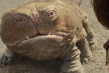 "JOHN CARTER"L to R: Woola, John Carter (Taylor Kitsch)?Disney Enterprises, Inc. All Rights Reserved.