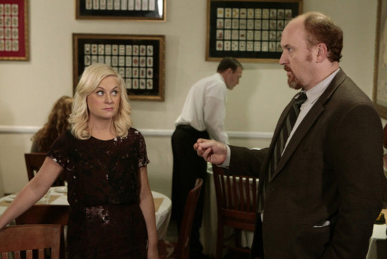 PARKS AND RECREATION -- "Dave Returns" Episode 415 -- Pictured: (l-r) Amy Poehler as Leslie Knope, Louis C.K. as Dave Sanderson-- Photo by: Chris Haston/NBC PARKS AND RECREATION -- "Dave Returns" Episode 415 -- Pictured: (l-r) Amy Poehler as Leslie Knope, Louis C.K. as Dave Sanderson-- Photo by: Chris Haston/NBC