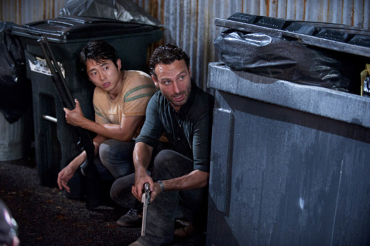 Glenn (Steven Yeun) and Rick Grimes (Andrew Lincoln) - Walking Dead - Season 2, Episode 9 - Photo Credit: Gene Page/AMC