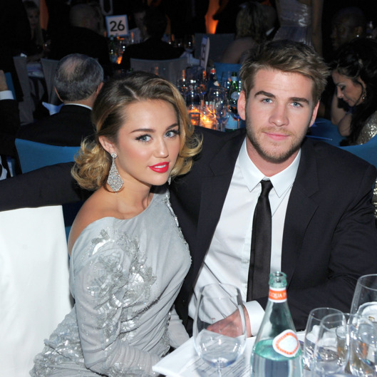 Singer Miley Cyrus and actor Liam Hemsworth attend the 20th Annual Elton John AIDS Foundation Academy Awards Viewing Party at The City of West Hollywood Park on February 26, 2012 in Beverly Hills, California.