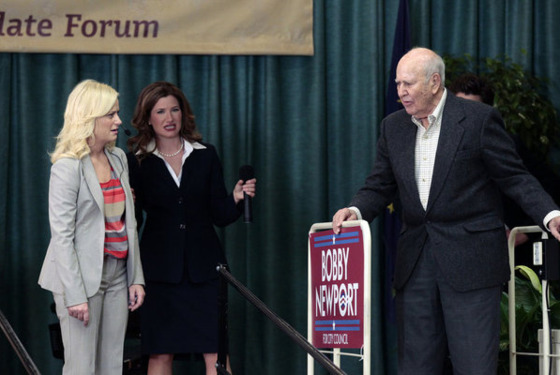 PARKS AND RECREATION -- "Campaign Shake-Up" Episode 417 -- Pictured: (l-r) Amy Poehler as Leslie Knope, Kathryn Hahn as Jennifer Barkley, Carl Reiner as Nes Jones -- Photo by: Chris Haston/NBC PARKS AND RECREATION -- "Campaign Shake-Up" Episode 417 -- Pictured: (l-r) Amy Poehler as Leslie Knope, Kathryn Hahn as Jennifer Barkley, Carl Reiner as Nes Jones -- Photo by: Chris Haston/NBC