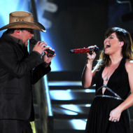 LOS ANGELES, CA - FEBRUARY 12: Singers Jason Aldean (L) and Kelly Clarkson perform onstage at the 54th Annual GRAMMY Awards held at Staples Center on February 12, 2012 in Los Angeles, California. (Photo by Kevin Winter/Getty Images) LOS ANGELES, CA - FEBRUARY 12: Singers Jason Aldean (L) and Kelly Clarkson perform onstage at the 54th Annual GRAMMY Awards held at Staples Center on February 12, 2012 in Los Angeles, California. (Photo by Kevin Winter/Getty Images)