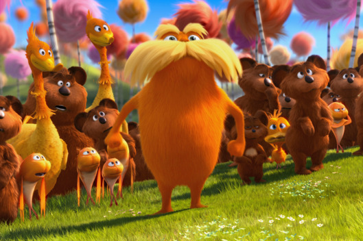 The Lorax (DANNY DEVITO) stands with the Bar-ba-loots, Swomee-Swans and Humming-Fish in "Dr. Seuss' The Lorax".