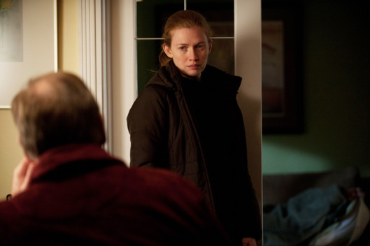 Lt. Michael Oakes (Garry Chalk) and Sarah Linden (Mireille Enos) - The Killing - Season 2, Episode 1 - Photo credit: Carole Segal/AMC