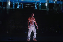 A hologram of deceased rapper Tupac Shakur performs onstage during day 3 of the 2012 Coachella Valley Music & Arts Festival