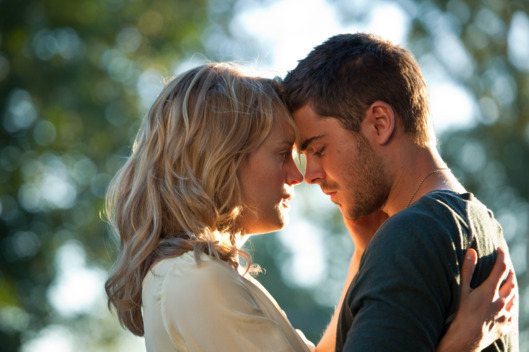 (L-r) TAYLOR SCHILLING as Beth Green and ZAC EFRON as Logan Thibault in Warner Bros. Pictures’ and Village Roadshow Pictures’ romantic drama “THE LUCKY ONE,” a Warner Bros. Pictures release.