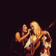 LONDON, UNITED KINGDOM - NOVEMBER 24: Cher and Gregg Allman perform on stage at the Rainbow Theatre in London, England on November 24, 1977. (Photo by David Redfern/Redferns) LONDON, UNITED KINGDOM - NOVEMBER 24: Cher and Gregg Allman perform on stage at the Rainbow Theatre in London, England on November 24, 1977. (Photo by David Redfern/Redferns)