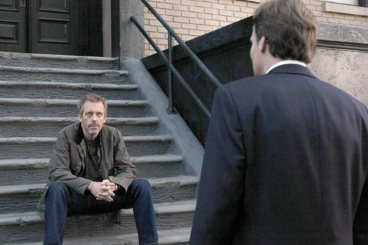 HOUSE: House (Hugh Laurie, L) has some news for Wilson (Robert Sean Leonard, R)